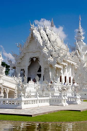 wat-rong-khun-temple-thailand-white-temple-chiang-rai-buddhism-dragons-white-chapel-thumbnail.jpg